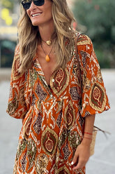 Vestido largo drapeado con estampados múltiples de los años 70